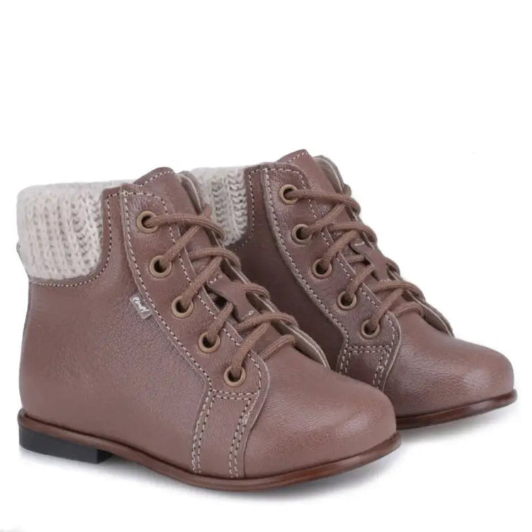 Pair of brown children's boots with white knit cuffs