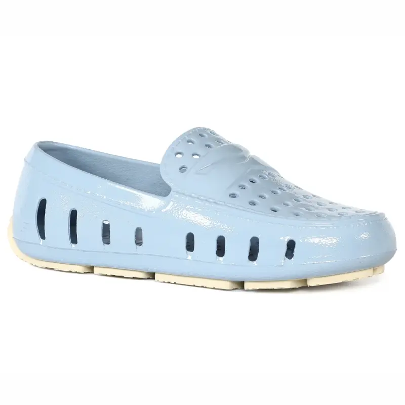 Light blue clog shoe on a white background