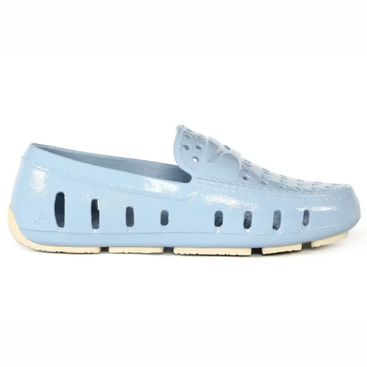 Light blue shoe with a white sole on a white background