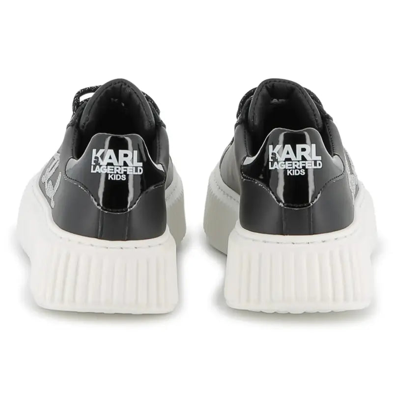 Black and white sneakers with Karl Lagerfeld Kids branding on a white background