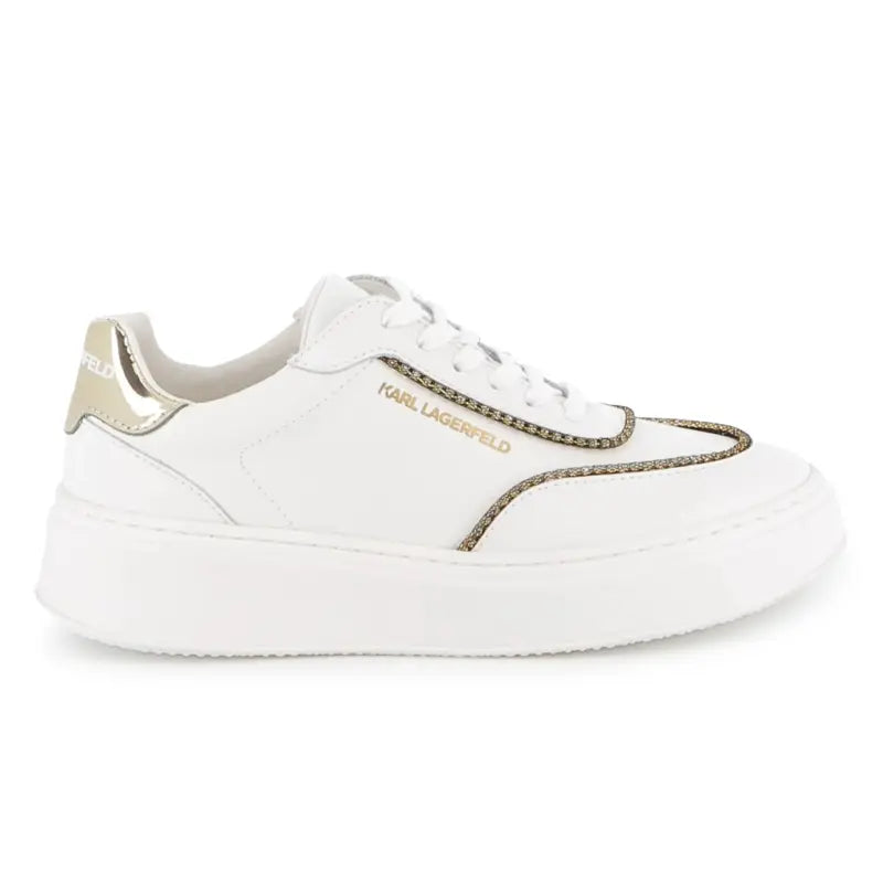 White sneaker with gold accents on a white background
