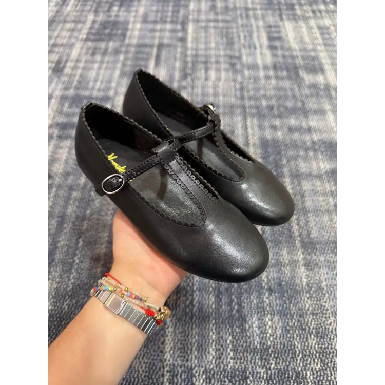 Black T-strap mary jane shoes with perf edging