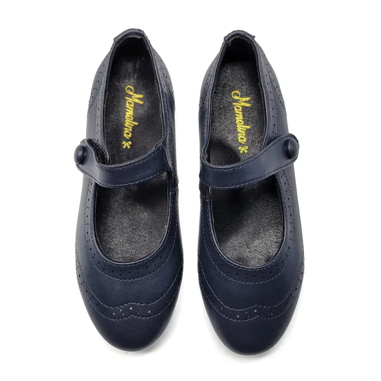 Pair of navy blue shoes with a brand logo on a white background