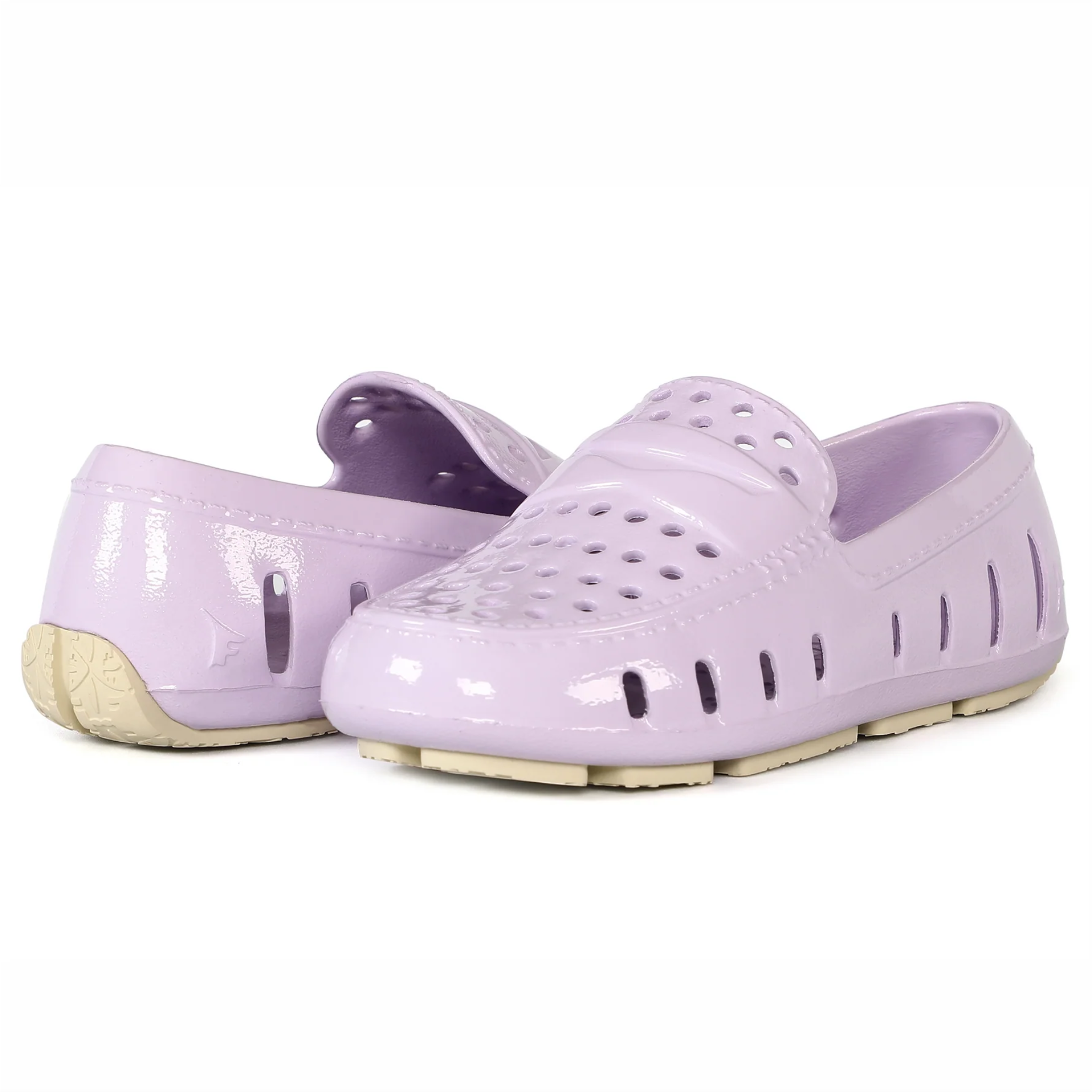 Pair of lavender clogs on a white background