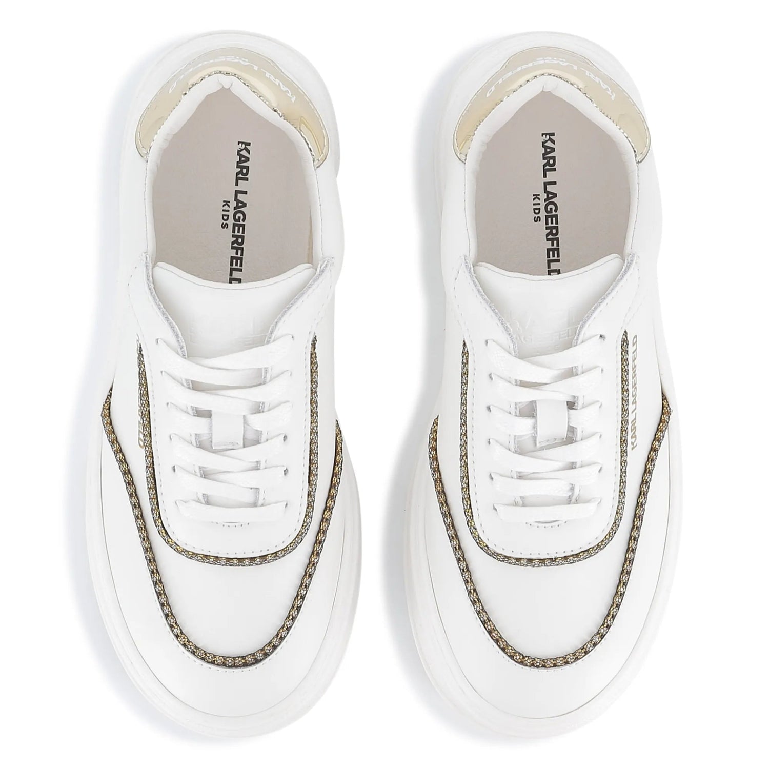 White sneakers with gold accents on a white background