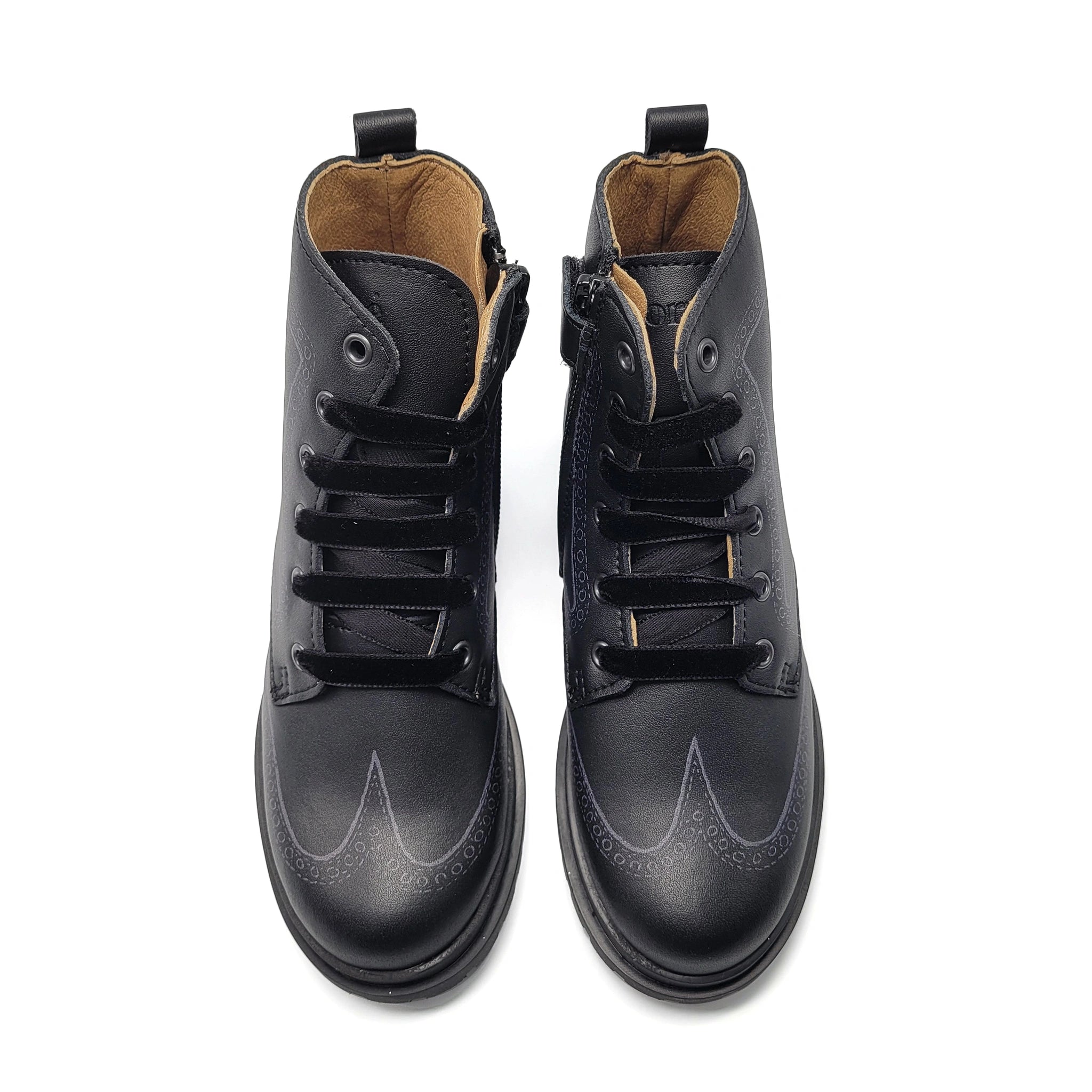 Pair of black leather boots on a white background