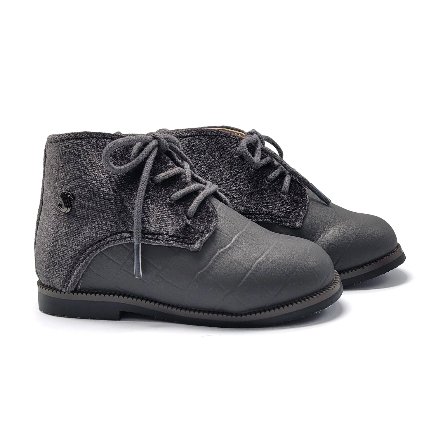 Pair of gray children's boots with lace-up design on a white background