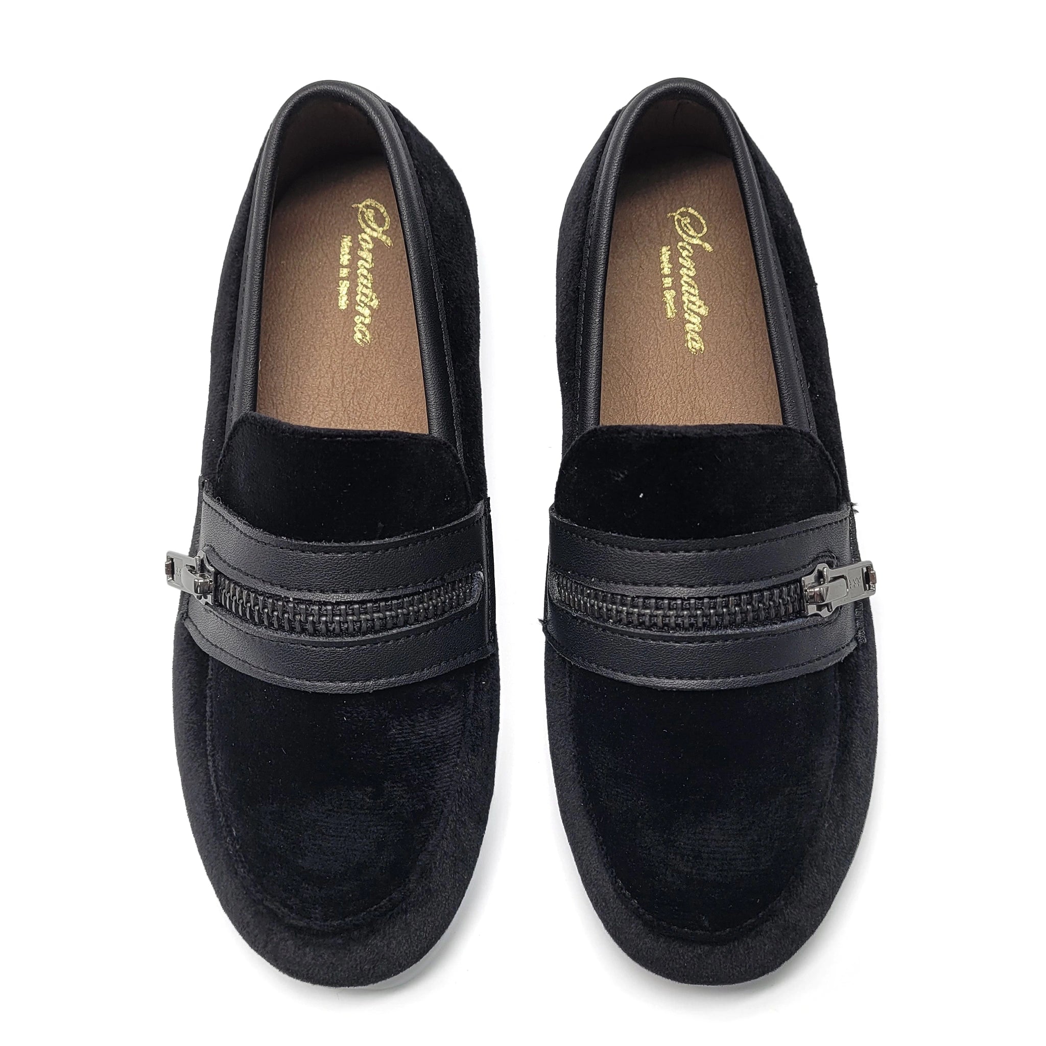 Pair of black loafers with a zipper detail on a white background