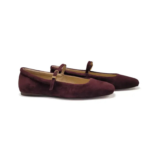 Pair of maroon suede shoes with brown straps on a white background