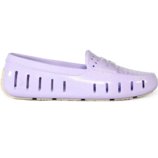 Purple flat shoe on a white background