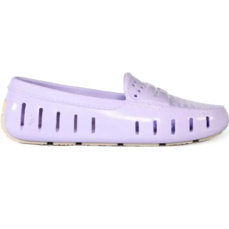 Purple flat shoe on a white background