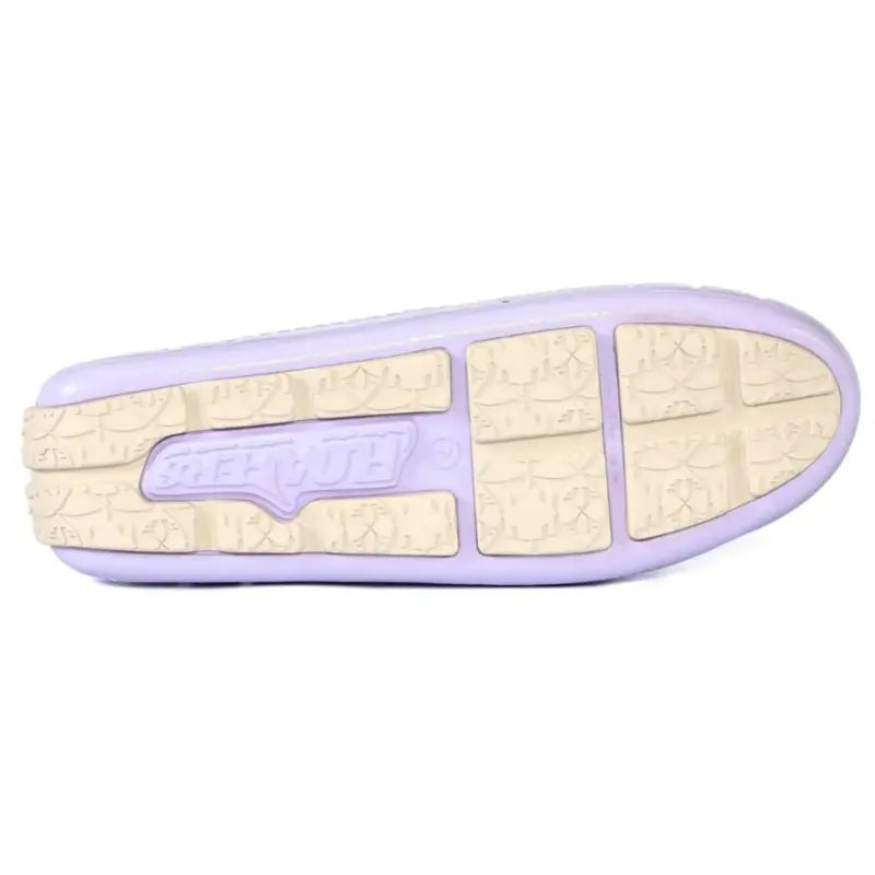 Close-up of a shoe sole with a brand logo on a white background