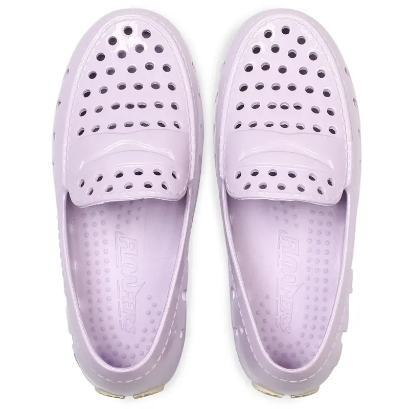 Pair of lavender clogs on a white background