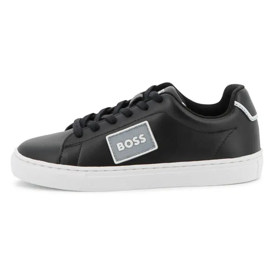 Black sneaker with a 'BOSS' logo on a white background