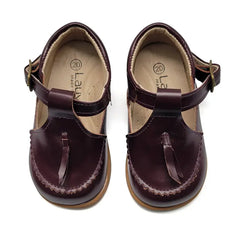 Pair of brown children's sandals with a strap on a white background
