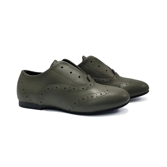 Pair of green shoes on a white background