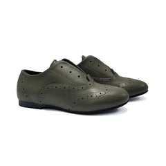 Pair of green shoes on a white background