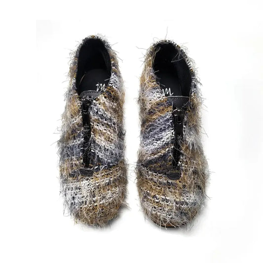 pair of textured shaggy front zipper bootes with blues browns taupes whites for little boys