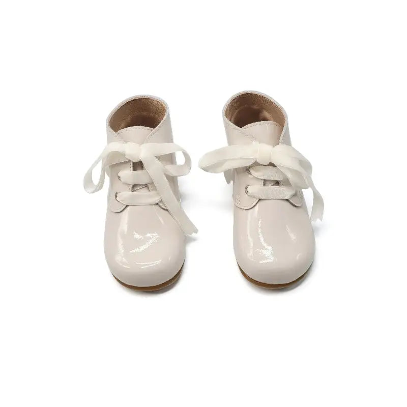 zubii-cream-patent-lace-up-baby-bootie-first-walker